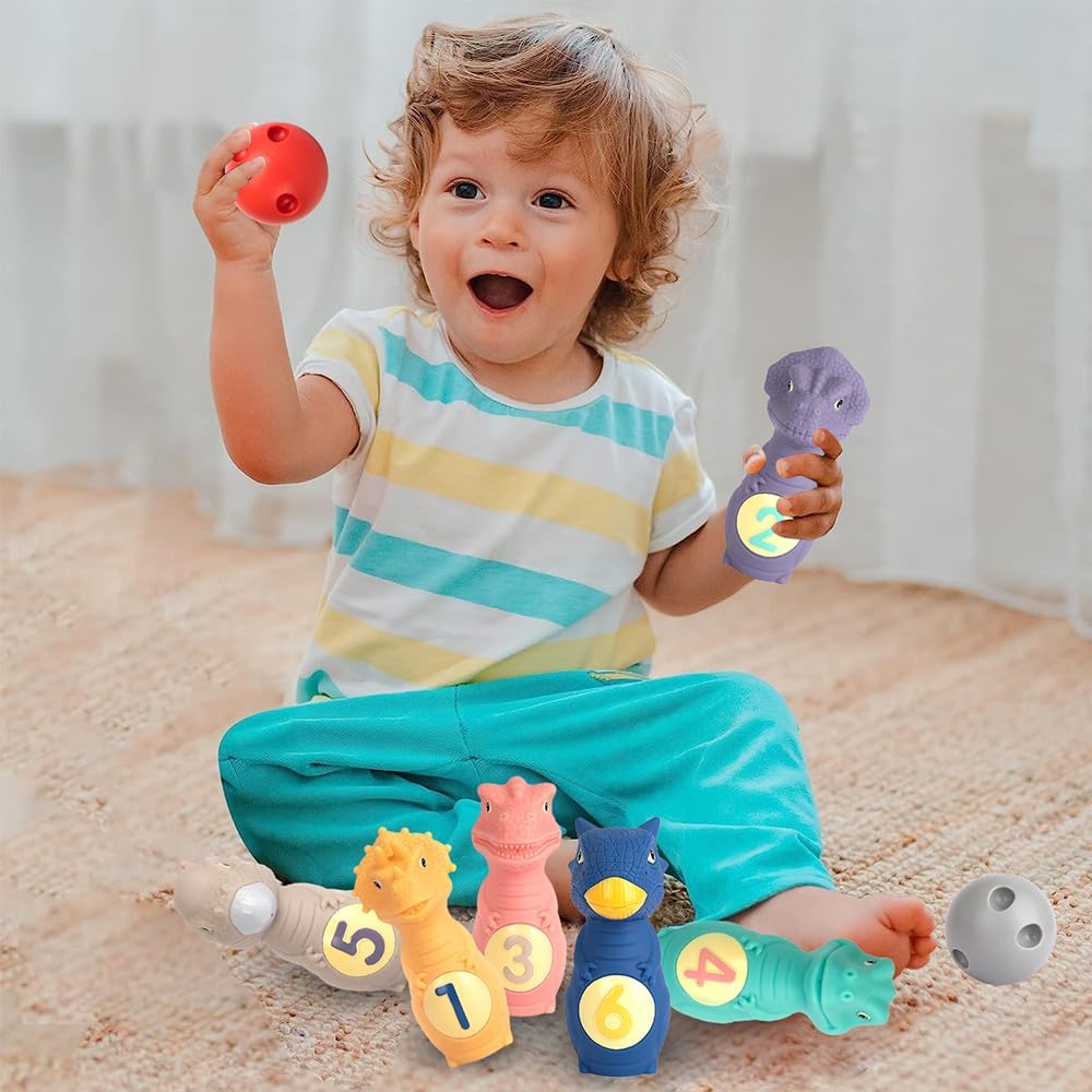 ArtCreativity Dinosaur Kids Bowling Set - 6 Dino Pins and 2 Balls - Durable Silicone Dinosaur Toys for Boys and Girls