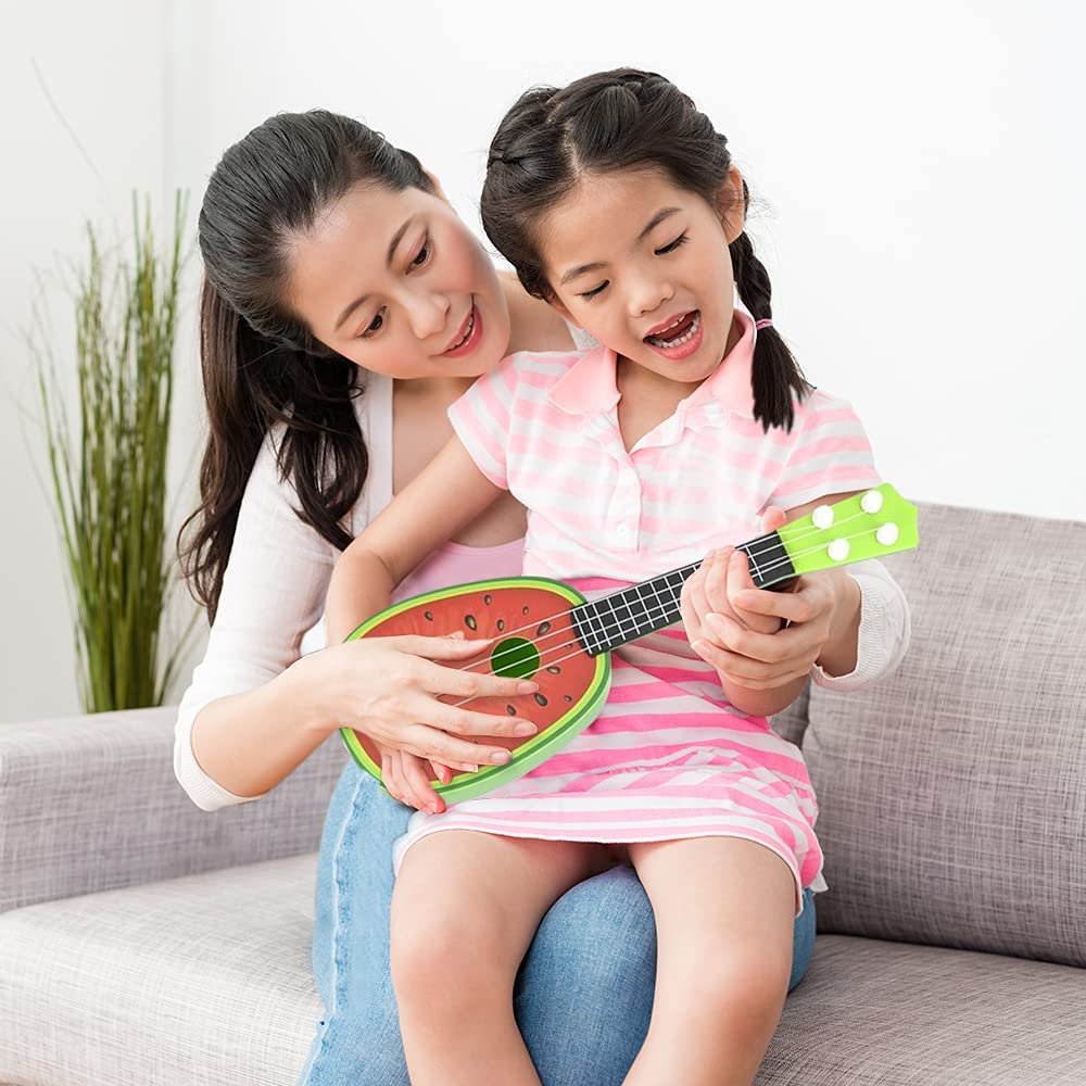 ArtCreativity Fruit Ukuleles for Kids, Set of 2, Fruit Mini Plastic Guitars in Colorful Fruity Designs, Music Instrument Ukuleles for Kids, Decorations for Summer and Luau Parties